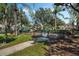 playground with various play structures and fenced area at 11542 Brightstowe Way, Orlando, FL 32836