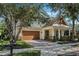 Charming two-story home with a large front yard and two-car garage at 11542 Brightstowe Way, Orlando, FL 32836