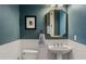 Small bathroom with white subway tile and a pedestal sink at 11542 Brightstowe Way, Orlando, FL 32836
