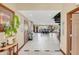 Bright entryway with tile floors, a spiral staircase, and views to the living area at 621 E Wildmere Ave, Longwood, FL 32750