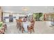 Bright dining area with wood table and chairs, located near kitchen at 621 E Wildmere Ave, Longwood, FL 32750