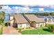 Lakefront home with two-car garage and landscaped yard at 621 E Wildmere Ave, Longwood, FL 32750