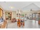 Spacious living area with high ceilings, large windows, and comfortable seating at 621 E Wildmere Ave, Longwood, FL 32750