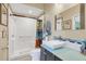 Updated bathroom with a walk-in shower and modern vanity at 621 E Wildmere Ave, Longwood, FL 32750