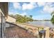Wooden deck with lake and backyard views at 621 E Wildmere Ave, Longwood, FL 32750