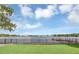 Expansive lake view from backyard, featuring a private dock at 621 E Wildmere Ave, Longwood, FL 32750