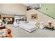 Bright living room featuring a large sectional sofa and high ceilings at 621 E Wildmere Ave, Longwood, FL 32750
