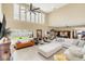 Lakefront living room boasting stunning water views and comfortable seating at 621 E Wildmere Ave, Longwood, FL 32750