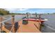 Private dock with boat and fire pit at 621 E Wildmere Ave, Longwood, FL 32750