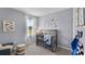 Bright Bedroom with crib, window, and nautical-themed decor at 2638 Sage Valley Way, Winter Haven, FL 33884