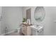 Small bathroom with pedestal sink, toilet and decorative accents at 2638 Sage Valley Way, Winter Haven, FL 33884