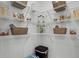 Well-organized pantry with wire shelving and ample storage at 2638 Sage Valley Way, Winter Haven, FL 33884