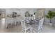 Kitchen and dining area with an island and seating at 2638 Sage Valley Way, Winter Haven, FL 33884