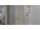Bathroom with shower and tub, and walk-in closet at 2634 Sage Valley Way, Winter Haven, FL 33884