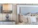 Close up of Primary bedroom with king bed and night stand at 2634 Sage Valley Way, Winter Haven, FL 33884