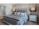 Primary bedroom with king bed and en-suite bathroom at 2634 Sage Valley Way, Winter Haven, FL 33884