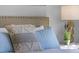 Primary bedroom with calming blue accents and soft textures at 2634 Sage Valley Way, Winter Haven, FL 33884