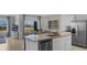 Modern kitchen with stainless steel appliances and granite countertops at 2634 Sage Valley Way, Winter Haven, FL 33884