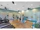 Modern fitness center featuring treadmills and weight machines at 906 Charo Pkwy # 433, Davenport, FL 33897