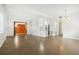 Open concept living room and kitchen with modern flooring at 4221 Mizell St, Orlando, FL 32812