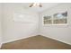 Bright bedroom with carpet flooring and window at 4221 Mizell St, Orlando, FL 32812
