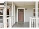 House exterior featuring a brown front door and porch at 4221 Mizell St, Orlando, FL 32812