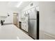 Modern kitchen with white cabinets and stainless steel appliances at 4221 Mizell St, Orlando, FL 32812