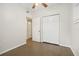 Bedroom with carpet flooring, double closet, and window at 4221 Mizell St, Orlando, FL 32812