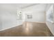 Spacious living room with terrazzo flooring and large windows at 4221 Mizell St, Orlando, FL 32812