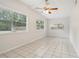 Bright dining area with tile flooring and multiple windows at 4221 Mizell St, Orlando, FL 32812