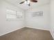 Bright bedroom with carpet flooring and window at 4221 Mizell St, Orlando, FL 32812