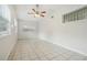 Bright bonus room with tiled floor and multiple windows at 4221 Mizell St, Orlando, FL 32812