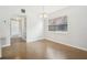 Spacious dining area with large window and neutral color palette at 4221 Mizell St, Orlando, FL 32812