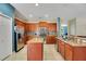 Modern kitchen with stainless steel appliances and granite countertops at 2053 Nobscot Pl, Apopka, FL 32703