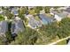 Aerial view showing houses, landscaping, and a neighborhood at 2053 Nobscot Pl, Apopka, FL 32703
