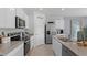 Bright kitchen featuring stainless steel appliances and ample counter space at 2622 Sage Valley Way, Winter Haven, FL 33884