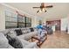 Open living room with kitchen view and seating area at 903 Charo Pkwy # 823, Davenport, FL 33897