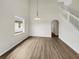 Spacious dining room with hardwood floors and a chandelier at 10472 Eastpark Lake Dr, Orlando, FL 32832