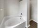 Bathroom with a large garden tub and separate shower at 10472 Eastpark Lake Dr, Orlando, FL 32832