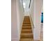 Light oak staircase with modern railing at 58 Overleaf Ln, Orlando, FL 32839