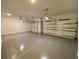Clean and spacious two-car garage with epoxy flooring at 58 Overleaf Ln, Orlando, FL 32839