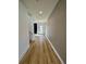Light and bright entryway with wood flooring and neutral walls at 58 Overleaf Ln, Orlando, FL 32839