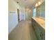 Spa-like bathroom with double vanity, quartz countertop and large shower at 58 Overleaf Ln, Orlando, FL 32839