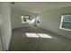 Spacious bedroom with neutral carpeting and ample natural light at 58 Overleaf Ln, Orlando, FL 32839