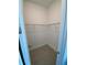 Spacious closet with wire shelving and carpeting at 58 Overleaf Ln, Orlando, FL 32839