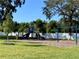 playground with swings and climbing structures at 58 Overleaf Ln, Orlando, FL 32839