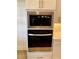Built-in microwave and oven with sleek stainless steel finish at 58 Overleaf Ln, Orlando, FL 32839