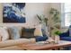 Beige sofa with blue accents in a bright living room at 2259 Howland Blvd, Deltona, FL 32738