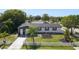 Aerial view of the house, showcasing the front yard and landscaping at 2259 Howland Blvd, Deltona, FL 32738