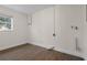 Laundry room with wood-look flooring and hookups for washer and dryer at 2259 Howland Blvd, Deltona, FL 32738